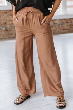 Feel comfortable and look stylish in our Heidi Drawstring Wide Leg Pant! Featuring a flattering wide-leg silhouette and an adjustable drawstring waistband, you'll stay comfortable while looking your best! Model Info: Models are 5'7", Size 2, wearing smalls Fabric: 100% polyester Sizes Hip Inseam Bottoms Trousers_Waist Outseam Relax Relax Relax Relax Relax S 39.8 27.9 24.9 26.4 40.2 M 41.7 28.0 26.0 28.3 40.6 L 43.7 28.0 27.1 30.3 40.9 XL 46.9 28.1 28.9 33.5 41.3 Elasticity None Razorback Shirt, Capri Blue, Plus Size Pants, Wide Leg Pant, Best Model, Look Stylish, Trendy Colors, Denim Pant, Matching Dresses