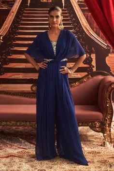 Electric blue draped jumpsuit with pleated bodice, embellished by bead-sequin floral motifs. - Aza Fashions Embellished V-neck Jumpsuits And Rompers For Evening, V-neck Embellished Jumpsuits And Rompers For Evening, Elegant Blue Wedding Jumpsuits And Rompers, Embellished Floor-length Jumpsuits And Rompers For Formal Occasions, Embellished Floor-length Jumpsuits For Formal Events, Festive Embellished Floor-length Jumpsuits And Rompers, Formal Embellished Floor-length Jumpsuits And Rompers, Formal Floor-length Embellished Jumpsuits And Rompers, Elegant Embellished Jumpsuits And Rompers For Festive Season