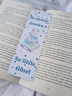 an open bookmark that reads so many books so little time