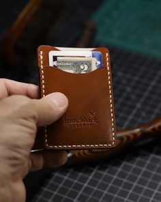 The "Clam 2.0" - a refined, minimalist card wallet that seamlessly fits into both front or back pocket. This design is a subtle evolution of the original "Clam" wallet, featuring smoother curves and reduced card exposure for a sleeker, more sophisticated profile. **Key Features - **Capacity Holds up to 6 cards and some cash, providing just the right amount of space for your essentials without bulk. - **Design The Clam 2.0 is designed with meticulous attention to detail, offering a modern twist o Minimalist Card Wallet, Minimalist Card, Minimalist Cards, Front Pocket Wallet, Handmade Leather Wallet, Pocket Wallet, American Leather, Minimalist Wallet, Leather Conditioner