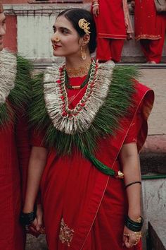 Red chinniya  silk saree with zardozi embroidered floral buttas. Comes with raw silk blouse.
Components:2
Pattern:Embroidered
Type of Work:Zardozi Work
Neckline:Round
Sleeve Type:Half
Fabric:Saree: Chiniya  Silk, Blouse: Raw Silk
Color:Red
Other Details:
Floral buttas
Note: The accessories worn by the model and the outfit worn by the male model is not for sale
Occasion:Wedding - Aza Fashions Raw Silk Blouse, Zardozi Work, Embroidered Saree, Blouse For Women, Saree With Blouse, Blouse Online, Red Blouses, Raw Silk, Aza Fashion