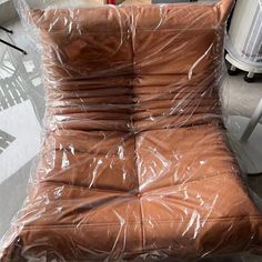 a chair that has been wrapped in plastic