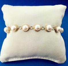 * Vintage Elegant 14K Yellow Gold Pearl June Wedding Panel Link Bracelet * Length: 7-1/2" * Width: 3/8" * Thirteen (13) 7 mm pearl panels * Weight: 11.1 tgw * Marked: 14K*Makers Mark * Condition: Great * G630    Exported By ExportYourStore :) June Wedding, Fine Jewelry Bracelets, Vintage Elegant, Gold Art, Gold Pearl, Pearl Bracelet, Makers Mark, Link Bracelets, Jewelry Watches