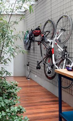 there is a bike hanging on the wall