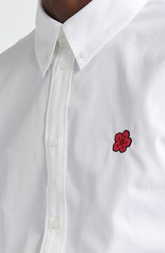 An embroidered boke flower at the chest brings a pop of color to a button-down shirt tailored from cotton oxford. Front button closure Button-down collar Long sleeves with button cuffs 100% cotton Machine wash, line dry Imported Designer Clothing Fabric Gift Bags, Embroidery Dress, Fabric Gifts, Tailored Shirts, Free Fabric, Anniversary Sale, Button Down Collar, Embroidered Flowers, Print Gifts