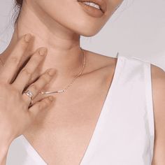 The 2018 Diamond Foundry Deco Capsule draws inspiration from the decadence of the roaring 20’s, made anew by fashioning the deco silhouettes into minimal designs better fit for the 2020s. The asymmetrical bar necklace set with seven scoop-set brilliant diamonds and a single baguette is the perfect bridal accessory or everyday stacking necklace. Size: 15-16" Adjustable Necklace / 35mm Pendant Stones: Cultivated White Diamonds - .18 TCW Please note, diamonds used are top quality - all will be VS-V Stacked Necklaces, Adjustable Necklace, Brilliant Diamond, Lab Diamonds, Bar Necklace, Stone Pendants, Earring Necklace, Bridal Accessories, Diamond White