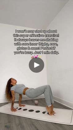 a woman is doing yoga on the floor