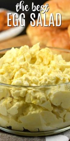 an egg salad in a glass bowl on a table