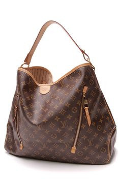 This Louis Vuitton Delightful GM bag is the ideal choice for days that require you to be well equipped. On the exterior, a sophisticated Monogram canvas, gold-tone hardware, and sumptuous Vachetta leather trim lend unrivaled Louis Vuitton elegance. Inside, ample room for anything from a day trip to a day in the office allows this handbag's appeal to extend far beyond appearance alone. ?ÿ ?ÿ ?ÿ Condition - Gently UsedThis bag is in?ÿgreat condition with a medium honey patina, spots of discoloration, and scratches on the Vachetta leather, minor wear on the trim, corners, exterior, glazed edges, and hardware.?ÿ ?ÿ?ÿ FeaturesMaterial: Monogram canvasColor: BrownLength:?ÿ17.5 inches?ÿ?ÿ Height:?ÿ14.5 inches?ÿ?ÿ Depth:?ÿ6.25 inchesHandle drop: 10 inchesOrigin: FranceDate code: FL3141Production y Louis Vuitton Delightful Mm, Louis Vuitton Delightful, Louis Vuitton Artsy Mm, My Style Bags, Louis Vuitton Artsy, Lv Handbags, Brown Aesthetic, Vintage Louis Vuitton, Vuitton Bag