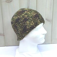 "This is a men's chunky, beanie crocheted in a camouflage yarn. The hat measures 9\" (22 cms) in depth from crown and will fit an average head circumference of 21 - 23.5\" (53 - 60 cms). Machine wash and dry, cool, gentle cycles, or hand wash, dry flat. Please read my policies and FAQ for more information. Shipping will be combined for multiple items within one order and a refund issued for overages. To view more of my items ..  lurayknitwear.etsy.com Every item is personally made by myself in m Hunting Hats, Green Beanie, Chunky Beanie, Hunting Hat, Camouflage Green, Shenandoah Valley, Large Sweaters, Chunky Crochet, Skull Cap Beanie