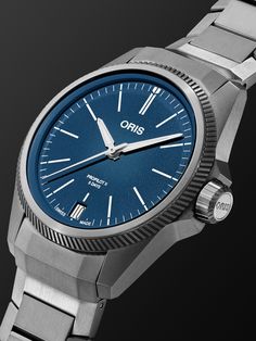 Oris' 'ProPilot PPX' timepiece pays homage to the watchmaker's founding era when pioneering aviators depended on Switzerland's precision to supplement their cockpit instruments. It's cast from sturdy titanium and centred with a blue dial, mapped with easy-to-read indices and a convenient date window. Super-LumiNova®-coated hands keep precise time to the Swiss-engineered automatic movement, which you can see through the exhibition case back. We offer a two-year warranty for all working parts and… Oris Propilot, Titanium Watches, Aviator Watch, The Exhibition, Luxury Watches For Men, Mr Porter, Luxury Watches, Time Piece, Blue