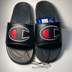 Champion Slide On Sandals Size 4y / 36 Eu New With Tag Comfortable Black Closed Toe Sport Sandals, Black Closed Toe Sports Sandals, Black Round Toe Flip Flops With Rubber Sole, Black Sporty Sandals With Round Toe, Black Open Toe Slippers For Streetwear, Black Non-slip Closed Toe Sport Sandals, Black Non-slip Sport Sandals With Round Toe, Black Non-slip Closed Toe Slides, Sporty Black Open Toe Flip Flops