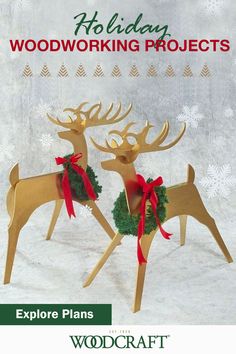 two wooden reindeer with wreaths on their backs