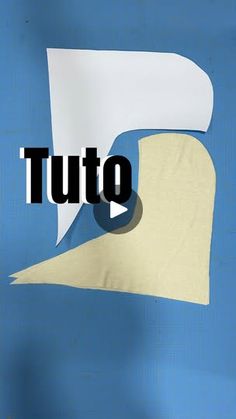 the word tutto is written in black and white on a blue background with an image of a roll of toilet paper