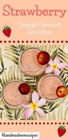 two glasses filled with orange coconut smoothie next to strawberries and flowers on a pink background