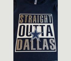 a t - shirt with the words straight out a dallas written in silver on it