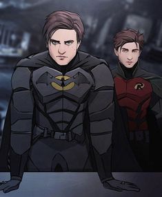 two young men dressed as batman and robin wayne standing in front of a dark background