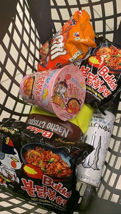 a basket filled with lots of different types of food in it's packagings