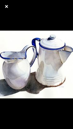 two white and blue pitchers sitting next to each other