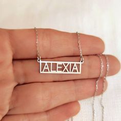 "Framed Name Necklace, Custom Nameplate Necklace, Dainty Name Necklace, Silver Name Necklace, Birthday Gift To Wife Girlfriend Sister Mother, P E R S O N A L I Z E D ∙ J E W E L R Y ❤ Handmade with love ❤ 🧿 Welcome to GDjeweltr. All our jewelery is made by handmade in our workshop as custom. The most unique gift you can find for you and your loved ones ♥ Please take a look my store to see our handmade necklaces, rings, earrings and bracelets collection. ⭐ Item Details: * Material: 14K Solid Gold * Finish: 14K Yellow Gold, 14K White Gold, 14K Rose Gold. * Material: High Quality Solid 925 Sterling Silver * Finish: Silver, Gold, Rose Gold. * Initial height: 9 mm * Chain width: 0.85 mm ✅ Making Process : All of our jewelry are handmade, carefully handcrafted and made to order. All of our prod Rectangular Name Jewelry For Birthday, Birthday Rectangular Name Jewelry, White Birthday Name Necklace, Silver Rectangular Name Necklace For Mother's Day, Rectangular Name Necklace Birthday Gift, Rectangular Name Necklace For Birthday Gift, Custom Name Necklace For Mother's Day, Personalized Rectangular Necklaces For Birthday, Customized Rectangular Necklace For Birthday Gift