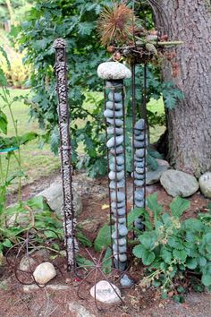 an outdoor sculpture made out of rocks and stones