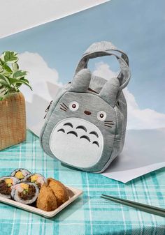 The Totoro shaped lunch bag is so cute, you'll want to pack your lunch every day! Official licensed by Studio Ghibli Designed in Japan Size: 6.3 × 4.96 × 7.09 in Material: Polyester, Cotton Cute Portable Lunch Bag, Back To School Portable Lunch Box, Totoro Bag, Kawaii Totoro, Ghibli Character, Pack Your Lunch, Studio Ghibli Characters, Holiday Soap, Japan Holidays