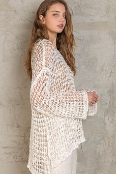 Throw on the Lucky in Love White Oversized Crochet Sweater for a cute and easy outfit! Off-white crochet shapes this oversized sweater with wide bell sleeves, a boat neckline, and a high-low hem. Pair with flare jeans for a boho look. DETAILS & CARE 55% Polyester, 45% Acrylic. Dry Clean or Machine wash cold. Imported. ORDERS, SHIPPING & RETURNS Orders, Shipping, & Returns Oversized Pointelle Knit Chic Top, Chic Oversized Pointelle Knit Top, Chic Long Sleeve Open Knit Crochet Top, Cozy Long Sleeve Tops For Vacation, Casual Knit Sweater With Boat Neck, Casual Boat Neck Knit Sweater, Casual Boat Neck Sweater For Spring, Chic Crochet Knit Top With Long Sleeves, Chic Long Sleeve Crochet Knit Top