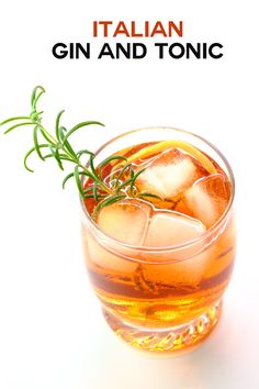 a glass filled with ice and garnished with rosemary