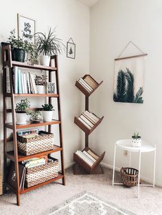 an image of a room with shelves and pictures on the wall, including bookshelves