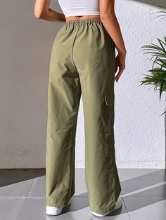 Stay effortlessly stylish with our Casual Plain Cargo Cropped Pant. These pants feature a cropped length and a clean, plain design, offering a versatile and contemporary style. With a relaxed fit and comfortable fabric, they are perfect for casual and everyday wear. These cargo cropped pants are a must-have addition to your wardrobe for a trendy and laid-back look.Specification: Style: Casual Pattern Type: Plain Type: Cargo Pants Closure Type: Elastic Waist Details: Pocket Waist Line: Natural Le Wide Leg Cotton Cargo Pants, Solid Color, Wide Leg Cotton Cargo Pants In Solid Color, Wide Leg Cotton Cargo Pants, Spring Utility Sweatpants With Relaxed Fit, Spring Utility Style Relaxed Fit Sweatpants, Casual Spring Parachute Pants With Straight Leg, Casual Straight Leg Parachute Pants For Spring, Casual Plain Pants For Work, Solid Color Wide Leg Parachute Pants For Spring