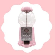 a pink and silver gummy machine with a white circle around the top on a pink background