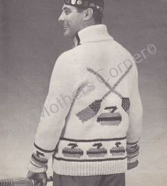 an old black and white photo of a man holding a tennis racquet