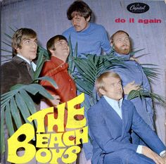 the beach boys album cover with palm trees in front of them and an image of three men wearing blue suits