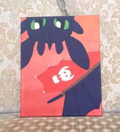 a painting of a black cat with green eyes on a red background, sitting on a couch