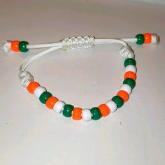 Nwot! Handmade Irish Bead Bracelet. Handcrafted In Ny, Usa. Unisex. One Size Fits Most. In The Colors Of The Flag Of Ireland. Plastic Beads And 550 Cording With A Well Woven Sliding Knot Enclosure. Handmade White Casual Beads, Handmade Adjustable White Beads, Casual White Jewelry With Wooden Beads, White Large Beads For Crafting, Large White Beads For Crafting, Casual Cream Beaded Bracelets As Gift, White Letter Beads Bracelets For Crafting, White Friendship Bracelets With 8mm Beads, Adjustable White Wooden Beads