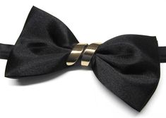 Beautiful silk pre-tied and adjustable double tiered banded bow tie. Will adjust from 13" through 19" neck. Bow dimensions 2.5" x 4.5". Elegant Pre-tied Adjustable Bow Tie, Elegant Adjustable Pre-tied Bow, Elegant Pre-tied Bow For Gift, Adjustable Satin Bow Tie For Parties, Adjustable Satin Bow For Party, Adjustable Black Tie Bow With Decorative Details, Formal Bow With Butterfly Knot, Elegant Bow Tie With Butterfly Knot, Elegant Adjustable Tie With Decorative Bow