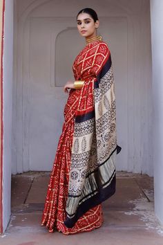 Red gharchola bandhani gajji silk saree with ajrakh hand block print zari pallu. Comes with ajrakh hand block print beige unstitched blouse piece. - Aza Fashions