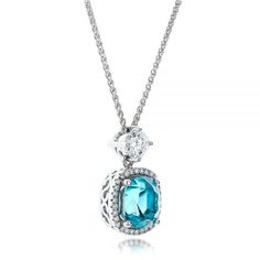 101181 18k White Gold Pendant    Blue Zircon - 6.54 ctw   1 Diamond - .50 ctw   30 Diamonds - .15 ctw   Clarity: VS2 - Color: F-G   16'' Spiga Chain   Joseph Jewelry. This elegant pendant features a cushion cut blue zircon surrounded by a halo of diamonds, all set in beautiful white gold. It was created as part of a matching gift set for a client from Bellevue, WA to go with earrings #101176, and we worked closely with him throughout the design process to ensure we got every detail of both piece Fine Jewelry Blue Topaz With Pave Setting, Blue Topaz Jewelry With Pave Setting For Anniversary, Blue Oval Jewelry With Pave Setting, Elegant Turquoise Jewelry With Brilliant Cut, Dazzling Blue Jewelry With Pave Setting, Formal Turquoise Jewelry With Halo Setting, Gift Jewelry With Blue Topaz In Pave Setting, Blue Cubic Zirconia Jewelry With Pave Setting, Fine Jewelry Aquamarine With Brilliant Cut