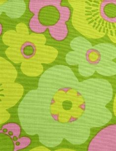 a green and pink flower print fabric