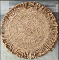 a round rug is shown on the floor