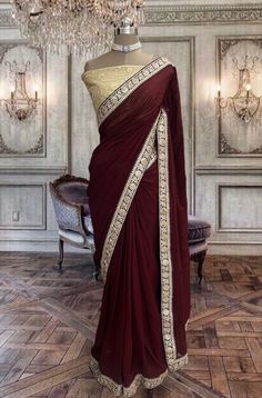 Beautiful deep maroon georgette saree with contrast beige blouse piece Maroon Saree Contrast Blouse, Wine Red Saree, Dark Maroon Saree, Dark Red Saree, Indian Party Wear Gowns, Sari India, Golden Blouse, Maroon Saree, Party Wear Gowns