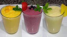 three glasses filled with different types of smoothies on top of a white plate next to each other