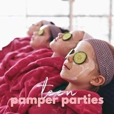 three women with cucumbers on their faces laying down in towels and wearing facial masks