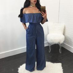 This simple chic denim jumpsuit is EVERYTHING. Featuring a ruffled hem off-the-shoulder collar and a cinched drawstring waist with flared legs. This jumpsuit pairs perfectly with wedges, heels or sandals. Made with a denim, polyester and acrylic blend this jumpsuits is comfy as well as stylish. Bandage Jumpsuits, Long Jumpsuit, Ruffle Jumpsuit, Casual Chique, Denim Chic, Long Jumpsuits, Overalls Women, Denim Flares, Denim Jumpsuit