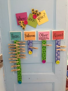 a door decorated with clothes pins and magnets