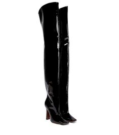 Subversive and striking, these Boomerang over-the-knee boots could only be from Vetements. They're made from patent leather with sharp, slanted toecaps and staggering plinth heels. | Vetements Boomerang leather over-the-knee boots Vetements Shoes, Leather Over The Knee Boots, High Leather Boots, Boomerangs, Boots For Women, Black Leather Boots, Online Sale, Brown Fashion, High Heel Boots