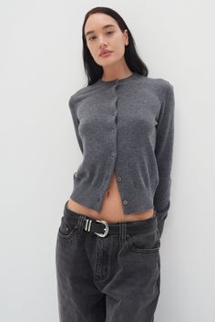 Introducing the Nikova Cardigan in Grey. The full length and ribbed hem, neckline, and cuffs provide a regular fit that keeps you cozy. Upgrade your wardrobe with this versatile and timeless piece. Outfits With Grey Cardigan, Basics Clothing, Grey Clothing, Grey Knit Cardigan, Trendy Fashion Accessories, Grey Style, School Tops