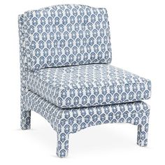 a blue and white patterned chair on a white background