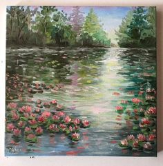 a painting of water lillies and trees in the background