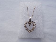 "OLD, VINTAGE STERLING SILVER CRYSTAL HEART PENDANT NECKLACE. THIS IS AN OLD PENDANT THAT I HAVE ADDED A NEW CHAIN TO. THIS PENDANT HAS BLING ! MEASURES OVER 7/8\" LONG. NICE WEIGHT. WEIGHS 5.6gm. SOLID STERLING MARKED 925. THE CHAIN IS 16\", MARKED 925 ITALY." Sterling Silver Costume Jewelry Necklace For Anniversary, Vintage Jewelry With Sparkling Stones For Gifts, Costume Jewelry Anniversary Pendant Necklace, Costume Jewelry Pendant Necklace For Anniversary, Anniversary Costume Jewelry Pendant Necklace, Vintage Necklace With Diamond Accents As Gift, Vintage Necklace With Diamond Accents For Gift, Vintage Necklaces With Diamond Accents For Gift, Silver Costume Jewelry For Valentine's Day